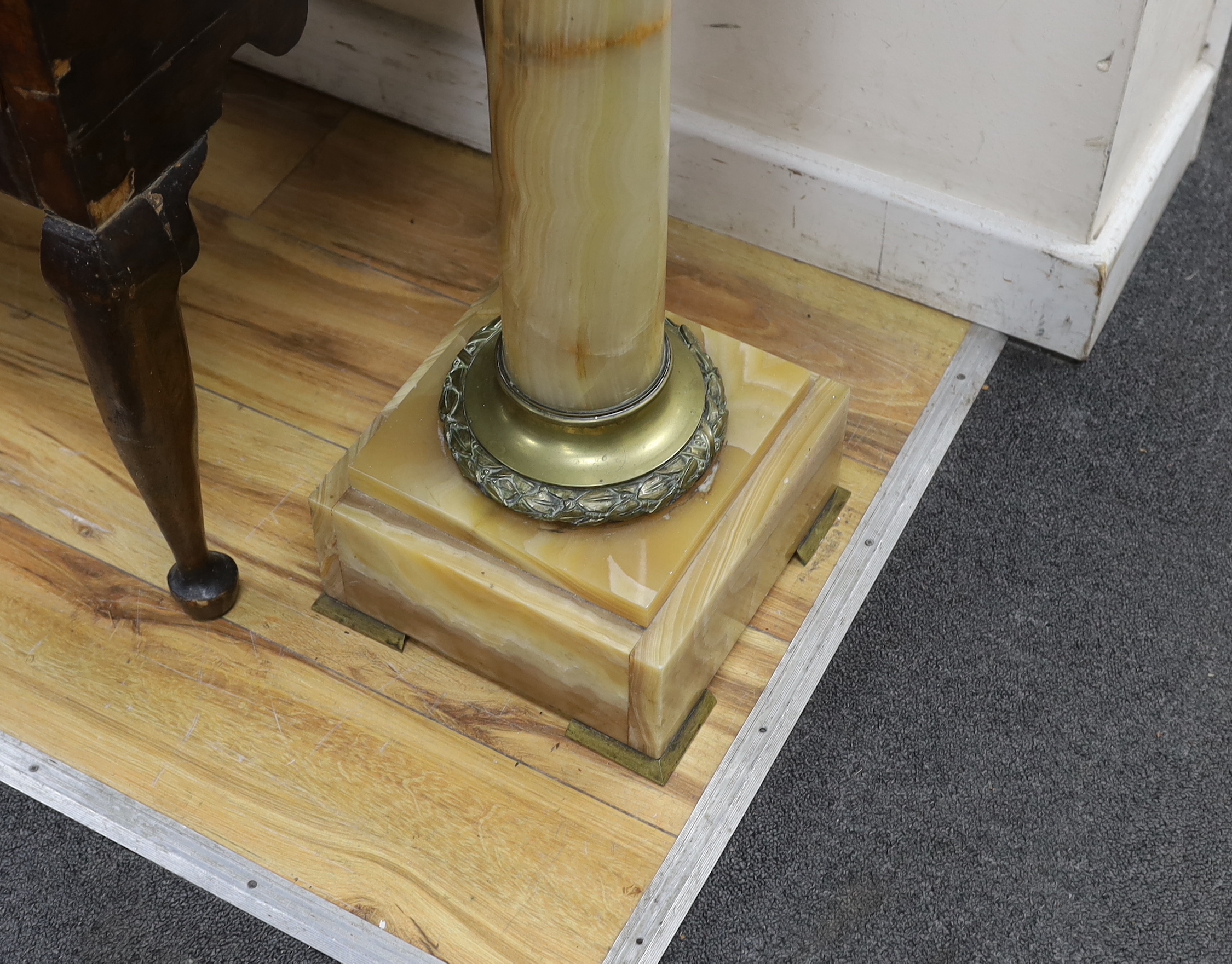 A gilt metal mounted and onyx pedestal, width 25cm, height 103cm